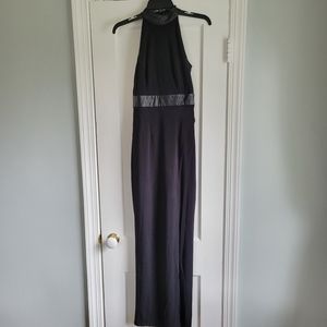 Black mock neck floor length dress with slit and leather detail